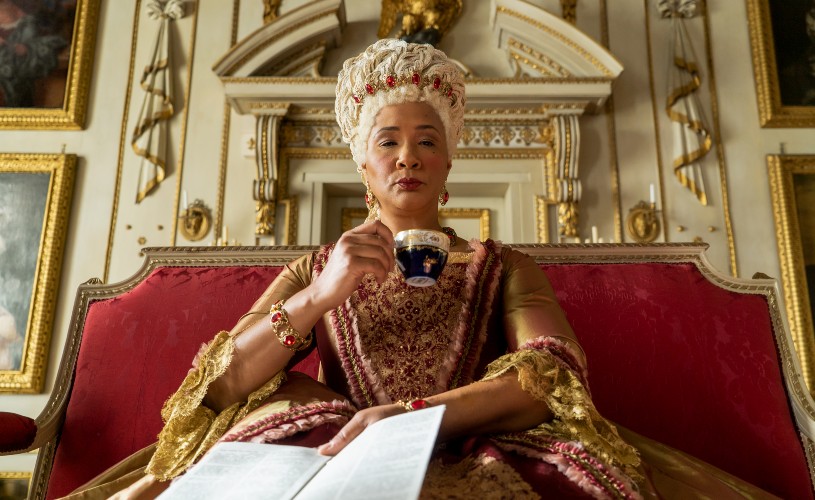 Queen Charlotte holding a tea cup in Bridgerton